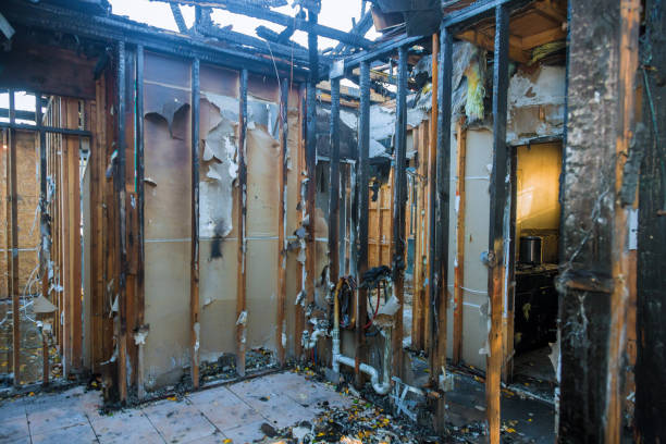 Professional Fire Damage Restoration technician working in Tawas City, MI